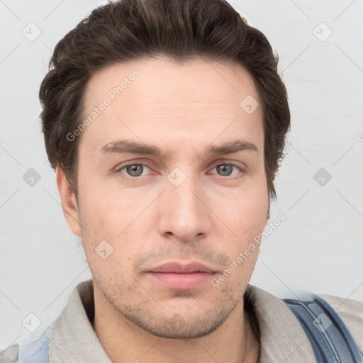 Neutral white young-adult male with short  brown hair and grey eyes