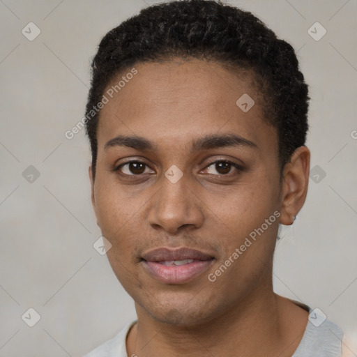 Joyful black young-adult male with short  black hair and brown eyes