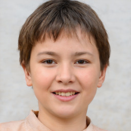 Joyful white child male with short  brown hair and brown eyes