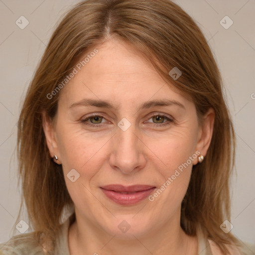 Joyful white adult female with medium  brown hair and grey eyes