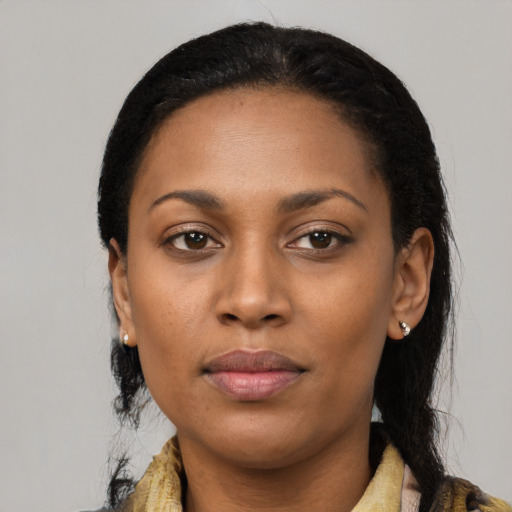 Neutral black young-adult female with long  black hair and brown eyes