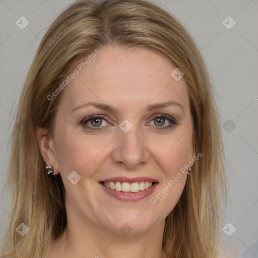 Joyful white adult female with medium  brown hair and grey eyes