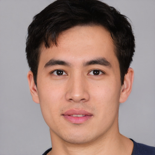 Neutral asian young-adult male with short  brown hair and brown eyes