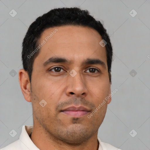 Neutral latino young-adult male with short  brown hair and brown eyes