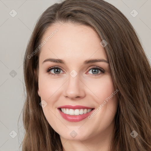 Joyful white young-adult female with long  brown hair and green eyes