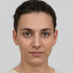 Neutral white young-adult female with short  brown hair and brown eyes