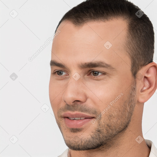 Joyful white young-adult male with short  brown hair and brown eyes