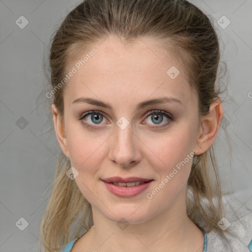 Joyful white young-adult female with medium  brown hair and blue eyes