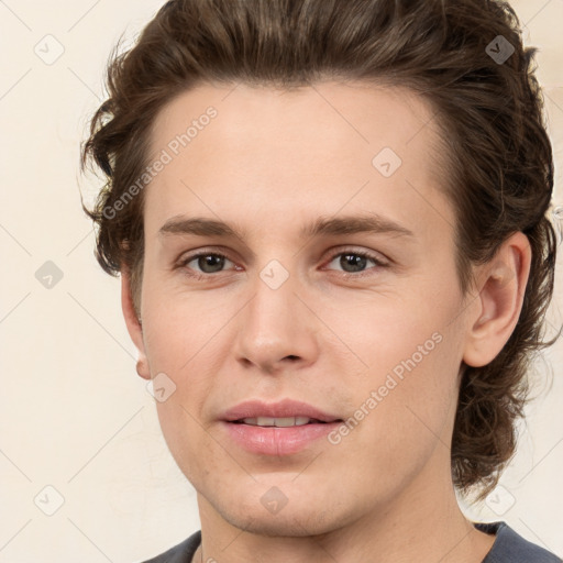 Joyful white young-adult male with medium  brown hair and brown eyes