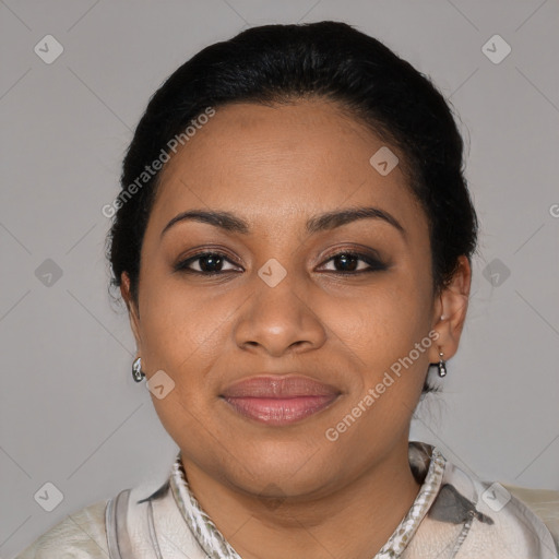 Joyful black young-adult female with short  black hair and brown eyes