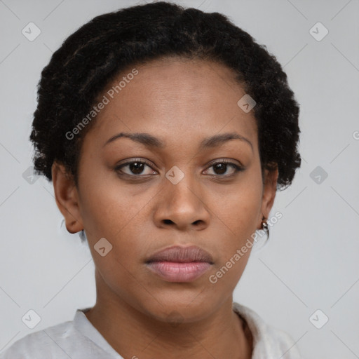 Neutral black young-adult female with short  brown hair and brown eyes