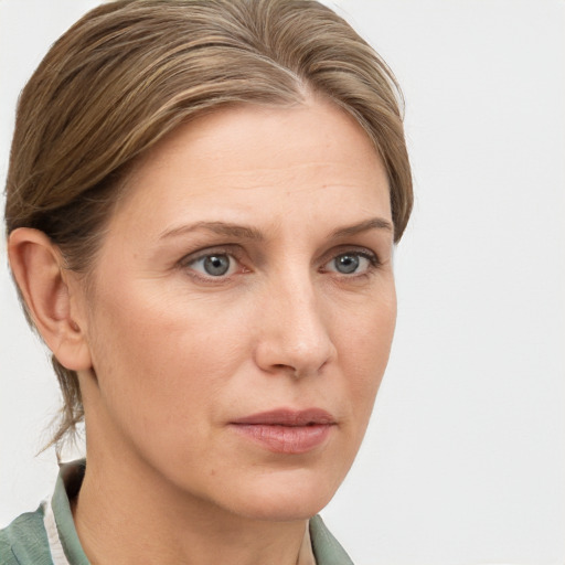 Neutral white young-adult female with medium  brown hair and grey eyes