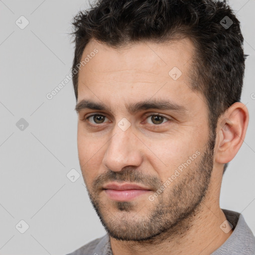 Neutral white young-adult male with short  brown hair and brown eyes