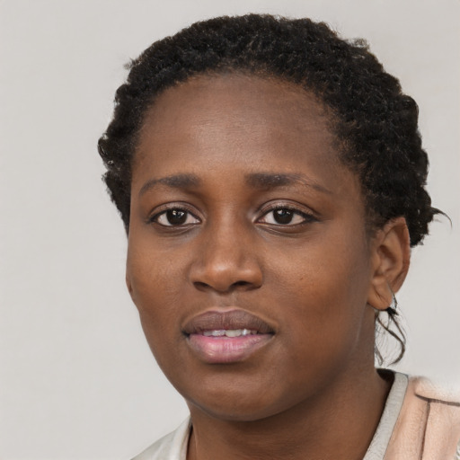 Neutral black young-adult female with short  brown hair and brown eyes