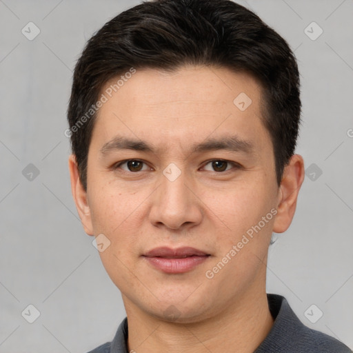 Joyful white adult male with short  brown hair and brown eyes