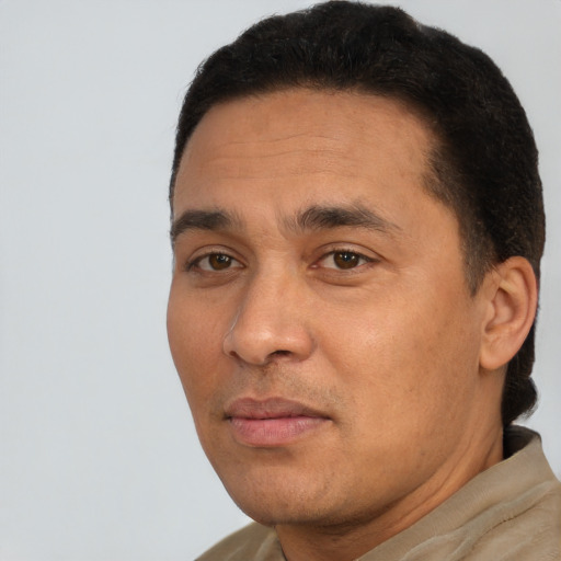 Neutral white adult male with short  black hair and brown eyes