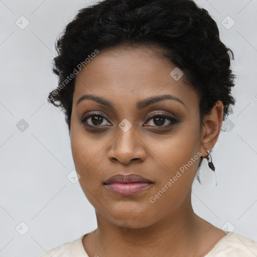 Joyful black young-adult female with short  brown hair and brown eyes