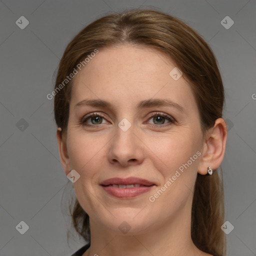 Joyful white young-adult female with medium  brown hair and grey eyes