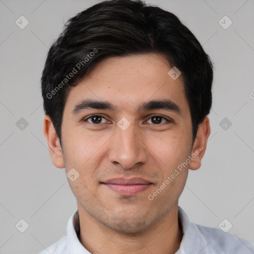 Joyful white young-adult male with short  black hair and brown eyes