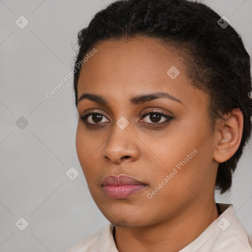 Neutral black young-adult female with medium  black hair and brown eyes