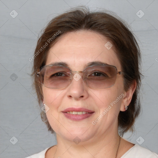 Joyful white adult female with medium  brown hair and brown eyes