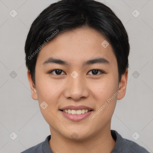 Joyful asian young-adult male with short  black hair and brown eyes