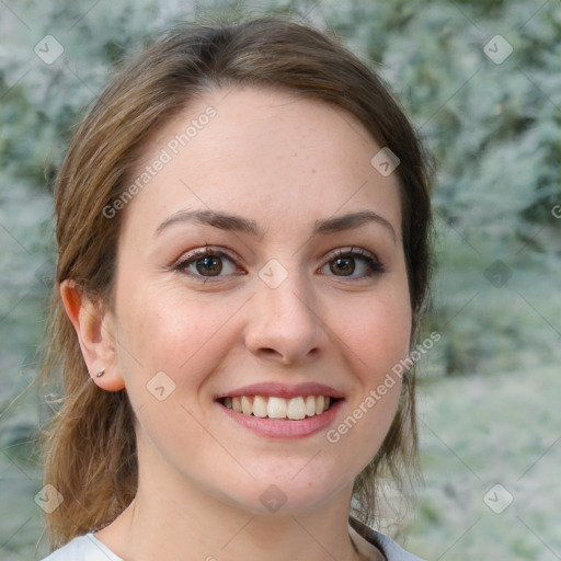 Joyful white young-adult female with medium  brown hair and green eyes