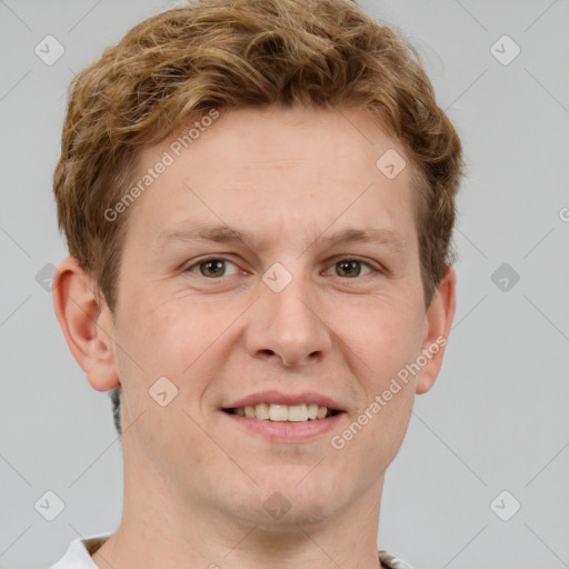 Joyful white adult male with short  brown hair and grey eyes