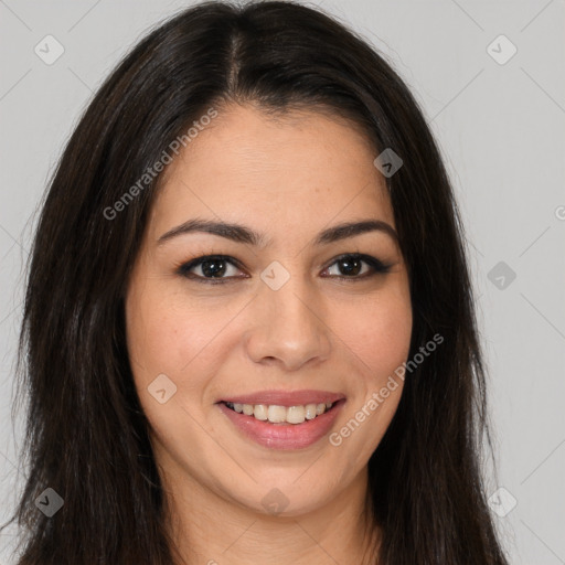 Joyful latino young-adult female with long  brown hair and brown eyes