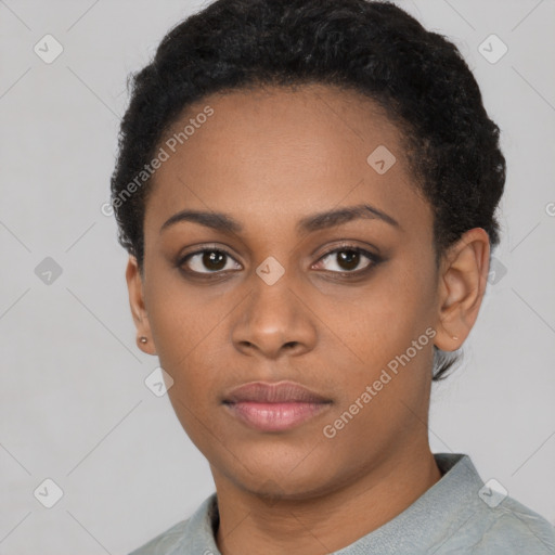 Neutral black young-adult female with short  black hair and brown eyes