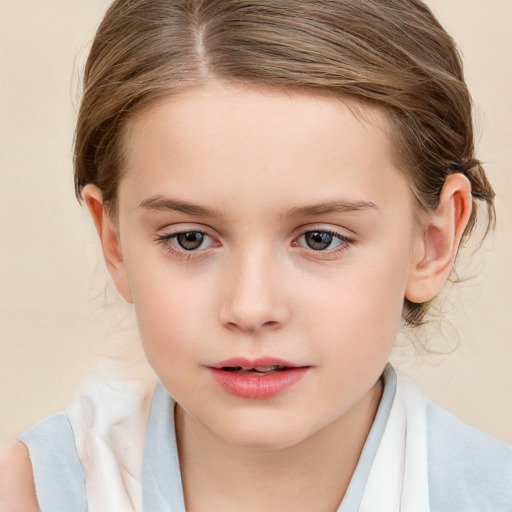 Joyful white child female with medium  brown hair and blue eyes