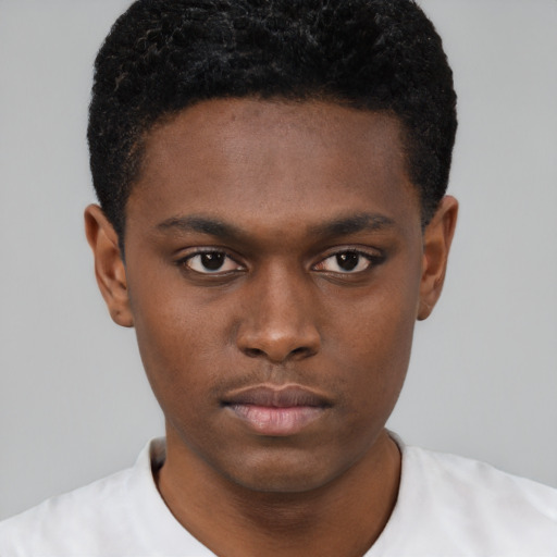 Neutral black young-adult male with short  brown hair and brown eyes