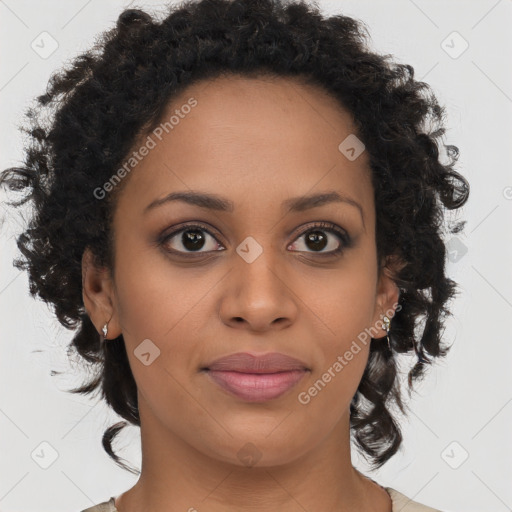 Joyful black young-adult female with medium  brown hair and brown eyes