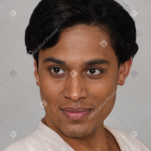 Joyful latino young-adult male with short  black hair and brown eyes