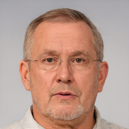 Neutral white middle-aged male with short  gray hair and brown eyes