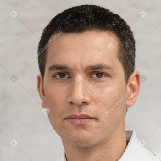 Neutral white adult male with short  black hair and brown eyes