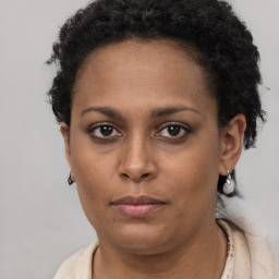 Neutral black young-adult female with short  brown hair and brown eyes