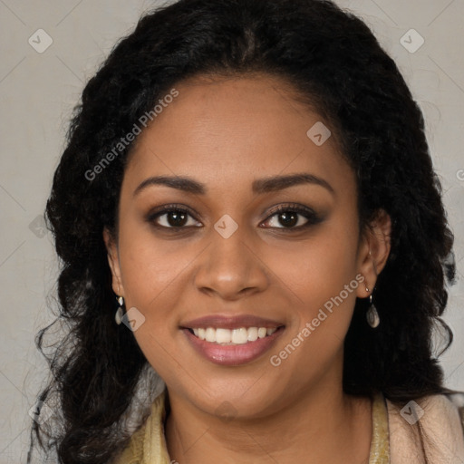 Joyful black young-adult female with long  brown hair and brown eyes