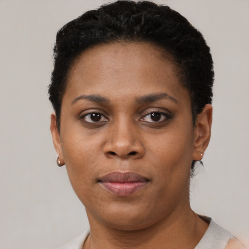 Neutral black young-adult female with short  brown hair and brown eyes