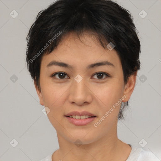 Joyful asian young-adult female with short  brown hair and brown eyes