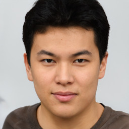 Neutral asian young-adult male with short  brown hair and brown eyes