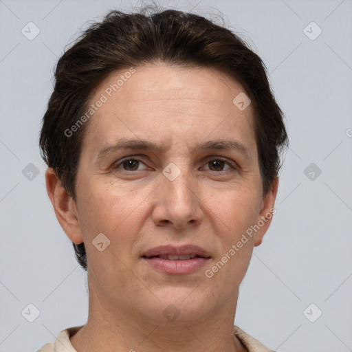 Joyful white adult female with short  brown hair and brown eyes