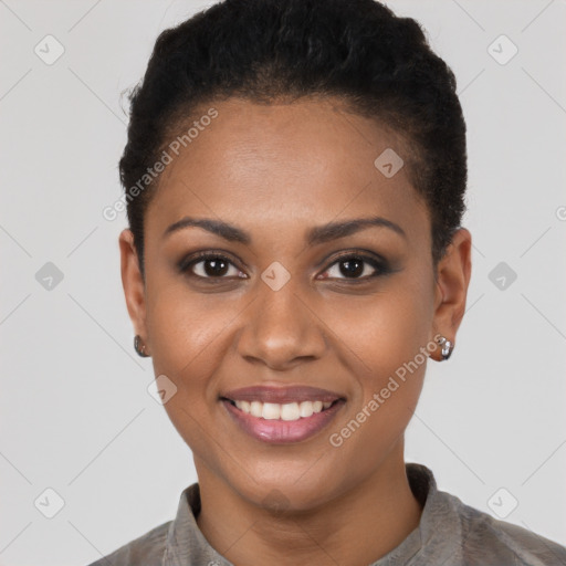 Joyful black young-adult female with short  brown hair and brown eyes