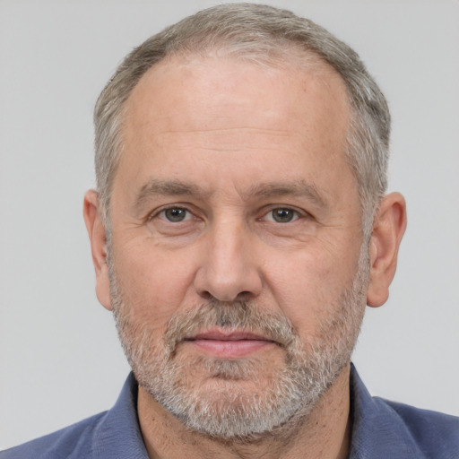 Neutral white middle-aged male with short  gray hair and brown eyes