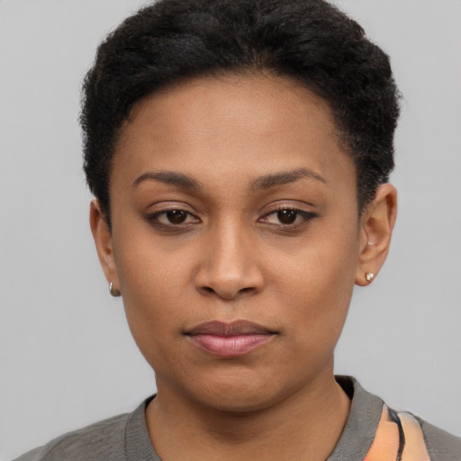 Neutral black young-adult female with short  black hair and brown eyes