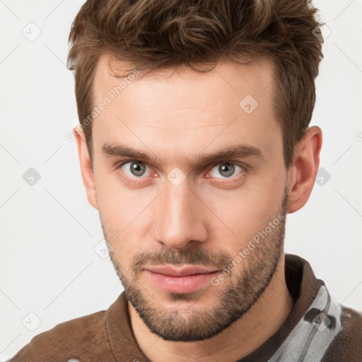 Neutral white young-adult male with short  brown hair and grey eyes