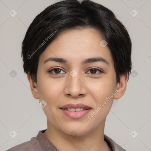 Joyful asian young-adult female with short  black hair and brown eyes