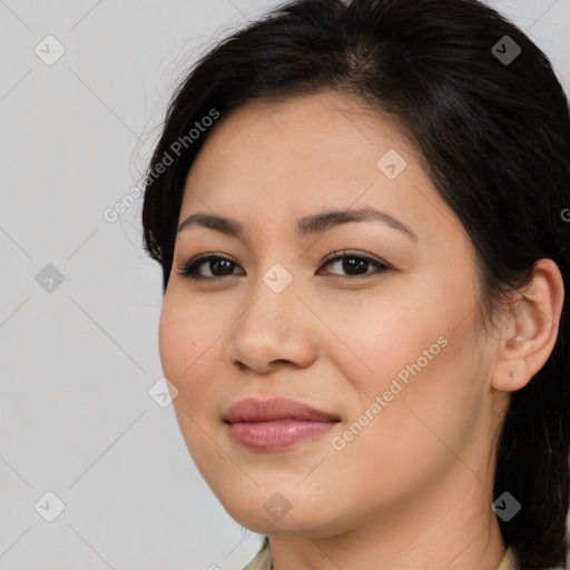 Joyful asian young-adult female with medium  black hair and brown eyes