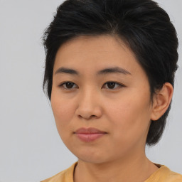 Neutral asian young-adult female with medium  brown hair and brown eyes