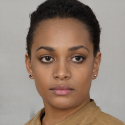 Neutral black young-adult female with short  brown hair and brown eyes